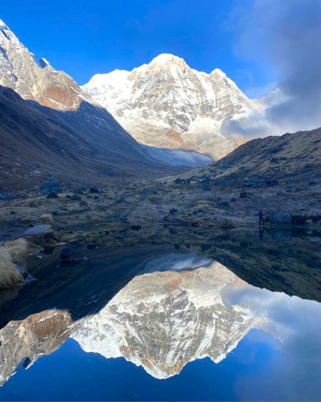 Panoramic 360-degree view of towering snowy peaks in Annapurna Sanctuary at Base Camp trek Nepal
