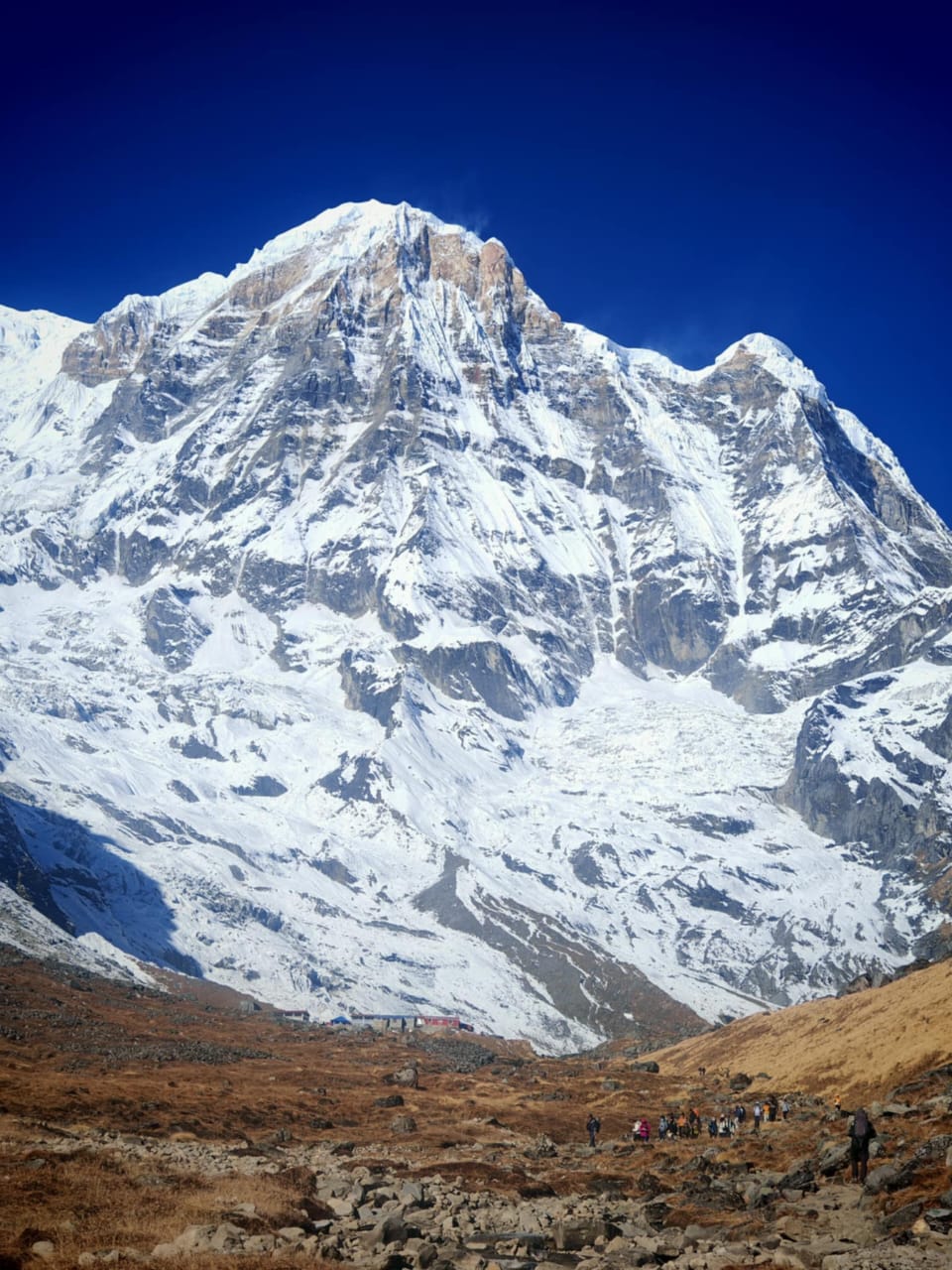 Majestic view of Hiunchuli or Annapurna peak against deep blue sky on Annapurna Base Camp trekking route