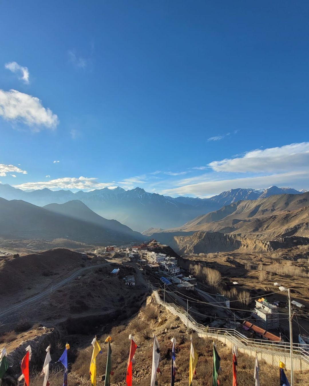 Colorful prayer flags fluttering in Upper Mustang wind