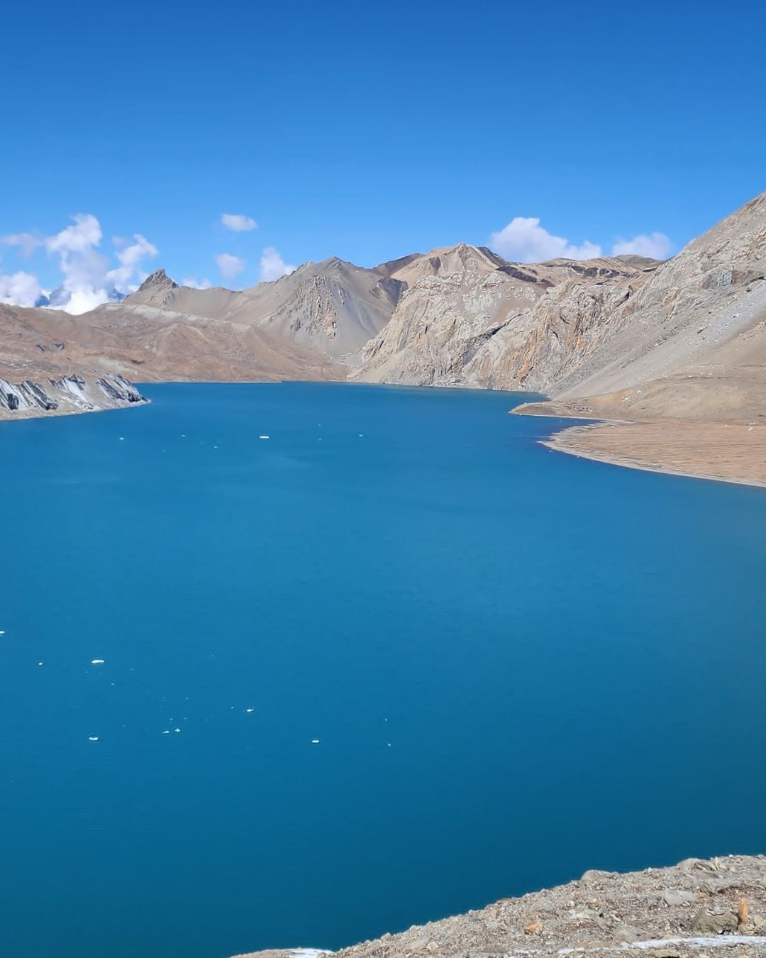 Aerial perspective of deep blue Tilicho Lake